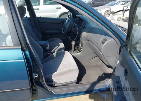 1994 Toyota Corolla Le/Dx z USA, uszkodzony, nr VIN 1NXAE09B3RZ147845